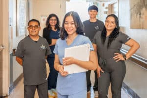 Several caregivers standing in the hallway at Beachwood Post-Acute and Rehab